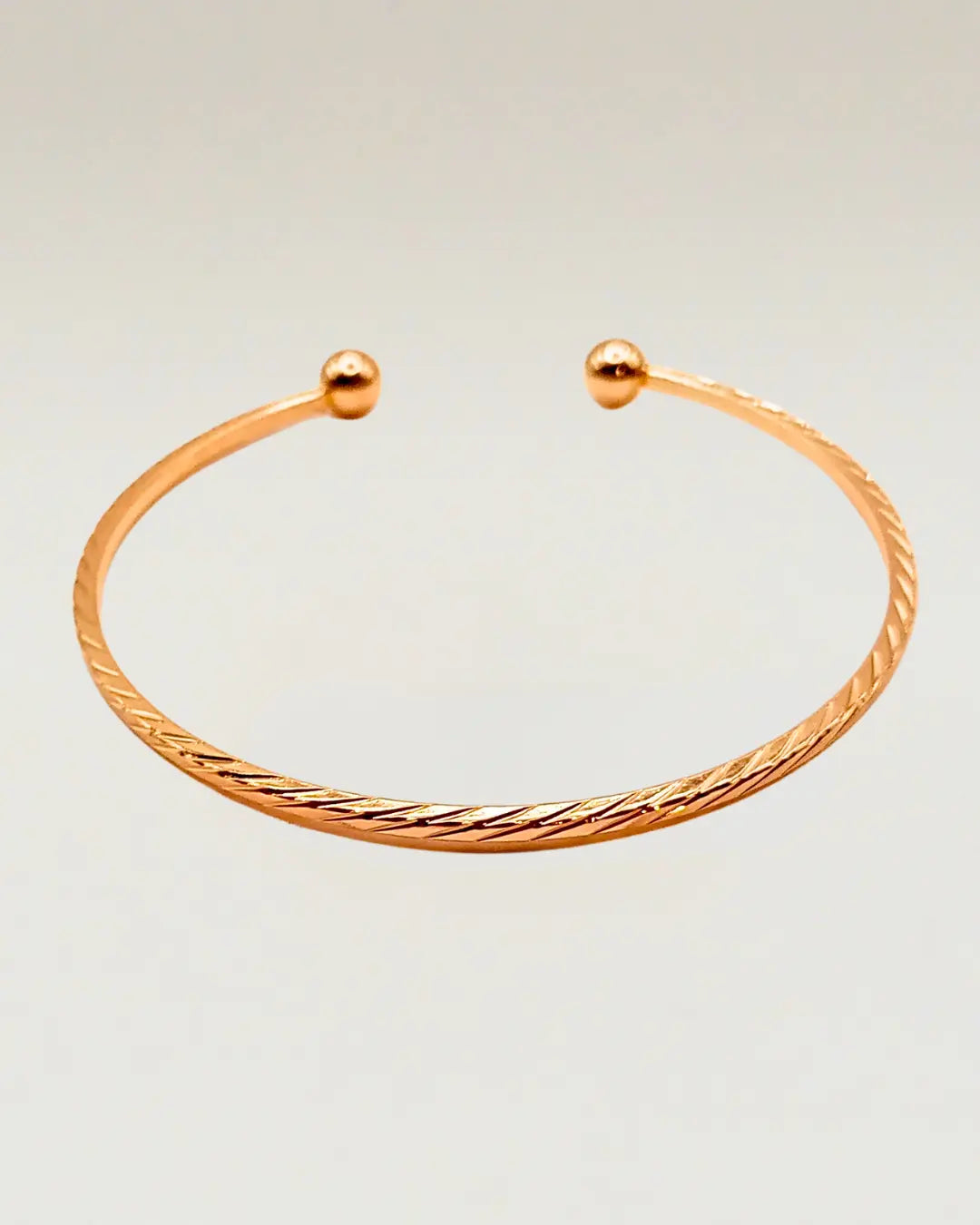 Rose Gold Knot Bangle