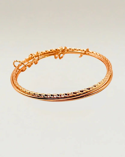 Linked Textured and Smooth Bangle Set