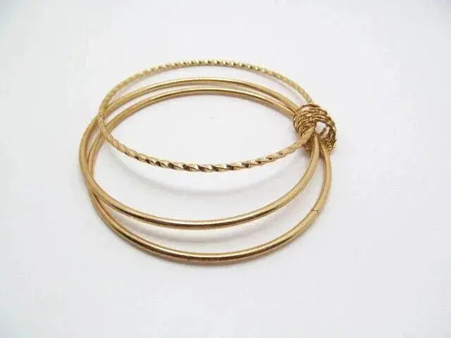 Linked Textured and Smooth Bangle Set