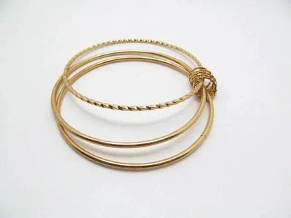 Linked Textured and Smooth Bangle Set